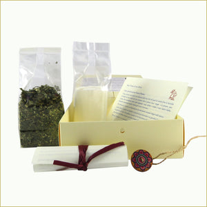 scatola illustrata con miscela di tè bio - ricami di nuvole